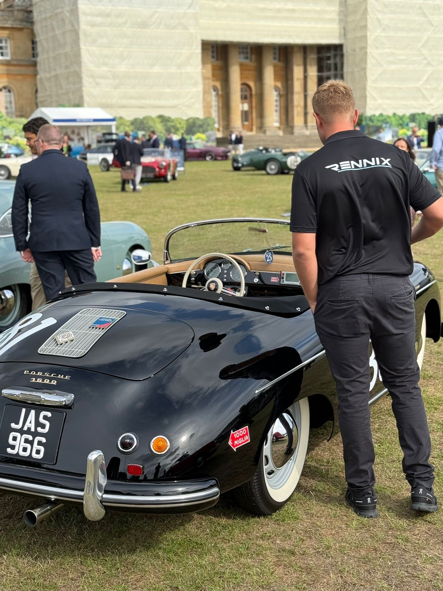Classic Porsche 1600 with a Bayles & Wylie team member at a car event; specialist automotive experience behind Bayles & Wylie Ltd storage in Nottinghamshire