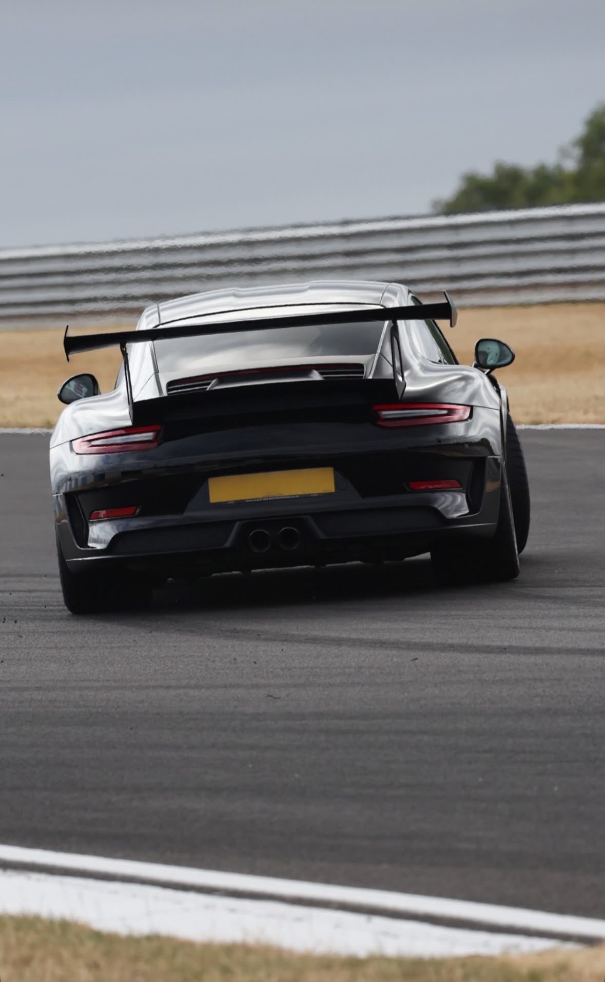 Black Porsche 911 on track; Bayles & Wylie Ltd’s specialist approach to prestige vehicle storage in Nottinghamshire
